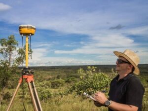 Construction survey equipment used for site control and wall layout checks during active field work.